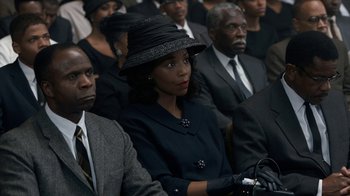 Movie still from “All the Way” (2016), directed by Jay Roach – A group of people in suits and hats sitting in a room; Close Up shot, High angle