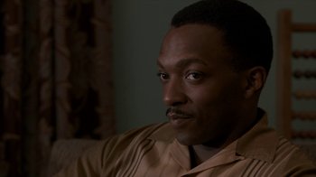 Movie still from “All the Way” (2016), directed by Jay Roach – A person sitting on a couch; Close Up shot, Over the shoulder angle