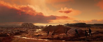 Movie still from “Allegiant” (2016), directed by Robert Schwentke – Two people are playing baseball in a field; Extreme Wide shot, High angle