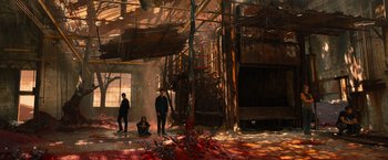 Movie still from “Allegiant” (2016), directed by Robert Schwentke – A painting of people standing in an abandoned factory; Extreme Wide shot, High angle