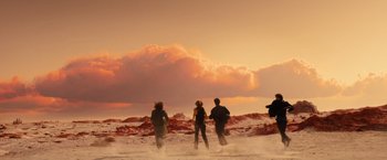 Movie still from “Allegiant” (2016), directed by Robert Schwentke – A group of people standing on top of a snow covered slope; Extreme Wide shot, Low angle