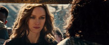 Movie still from “Allegiant” (2016), directed by Robert Schwentke – A person with long hair; Close Up shot, Over the shoulder angle