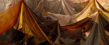 Movie still from “Allegiant” (2016), directed by Robert Schwentke – A room filled with lots and lots of fabric; Extreme Wide shot, Overhead angle