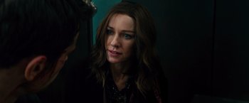 Movie still from “Allegiant” (2016), directed by Robert Schwentke – A person with long brown hair; Close Up shot, Over the shoulder angle