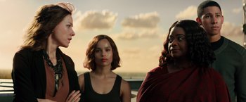 Movie still from “Allegiant” (2016), directed by Robert Schwentke – A group of women standing next to each other; Medium shot, Over the shoulder angle