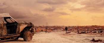 Movie still from “Allegiant” (2016), directed by Robert Schwentke – A man standing in the middle of an empty desert; Extreme Wide shot, Low angle