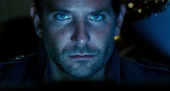 Movie still from “Aloha” (2015), directed by Cameron Crowe – A person with blue eyes; Close Up shot, Low angle