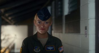 Movie still from “Aloha” (2015), directed by Cameron Crowe – A woman in a military uniform is wearing a hat; Close Up shot, Low angle