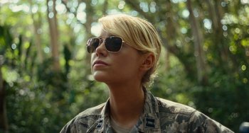 Movie still from “Aloha” (2015), directed by Cameron Crowe – A woman wearing sunglasses looking up at the sky; Close Up shot, Low angle