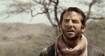 Movie still from “Aloha” (2015), directed by Cameron Crowe – A person wearing a scarf; Close Up shot, Over the shoulder angle
