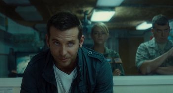 Movie still from “Aloha” (2015), directed by Cameron Crowe – A man and a woman in front of a bathroom mirror; Close Up shot, Over the shoulder angle
