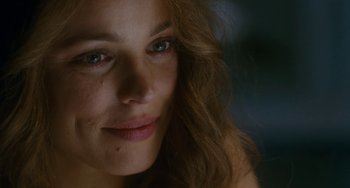 Movie still from “Aloha” (2015), directed by Cameron Crowe – A woman's face with long hair; Close Up shot, Over the shoulder angle