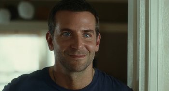 Movie still from “Aloha” (2015), directed by Cameron Crowe – A man's face with blue eyes; Close Up shot, Over the shoulder angle