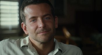 Movie still from “Aloha” (2015), directed by Cameron Crowe – A person wearing a white shirt; Close Up shot, Over the shoulder angle