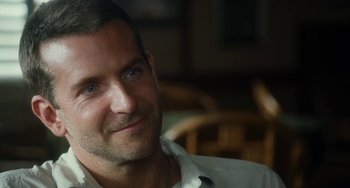 Movie still from “Aloha” (2015), directed by Cameron Crowe – A person wearing a white shirt; Close Up shot, Over the shoulder angle