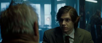 Movie still from “American Animals” (2018), directed by Bart Layton – A man in a suit and tie looking at a man in a suit and tie; Close Up shot, Over the shoulder angle