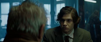 Movie still from “American Animals” (2018), directed by Bart Layton – A man in a suit looking at himself in the mirror; Close Up shot, Over the shoulder angle