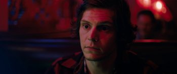 Movie still from “American Animals” (2018), directed by Bart Layton – A person wearing a plaid shirt; Close Up shot, Over the shoulder angle