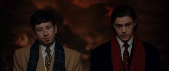 Movie still from “American Animals” (2018), directed by Bart Layton – Two men in suits and ties standing next to each other; Medium shot, Low angle