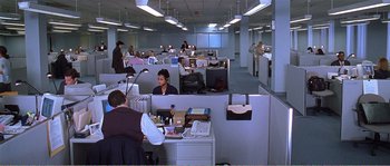 Movie still from “American Beauty” (1999), directed by Sam Mendes – A group of people in an office working on computers; Extreme Wide shot, High angle