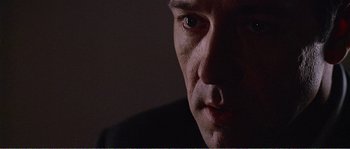 Movie still from “American Beauty” (1999), directed by Sam Mendes – A man's face in the dark; Extreme Close Up shot, Low angle