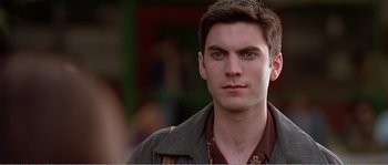 Movie still from “American Beauty” (1999), directed by Sam Mendes – A person wearing a jacket; Close Up shot, Low angle