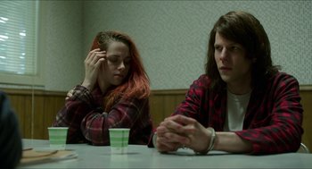 Movie still from “American Ultra” (2015), directed by Nima Nourizadeh – A man and a woman sitting at a table; Medium shot, Over the shoulder angle