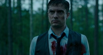 Movie still from “American Ultra” (2015), directed by Nima Nourizadeh – A man with blood on his face and chest; Close Up shot, Low angle