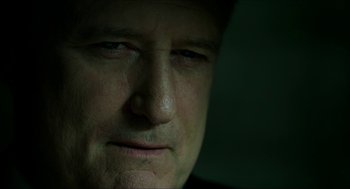 Movie still from “American Ultra” (2015), directed by Nima Nourizadeh – A man's face in the dark; Close Up shot, Low angle