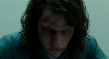 Movie still from “American Ultra” (2015), directed by Nima Nourizadeh – A person's face with blood on his face; Close Up shot, Low angle