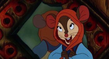 Movie still from “An American Tail” (1986), directed by Don Bluth – A cartoon picture of a mouse wearing a red hood; Close Up shot, Over the shoulder angle