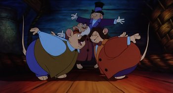 Movie still from “An American Tail” (1986), directed by Don Bluth – A group of cartoon characters in a room; Medium shot, Low angle