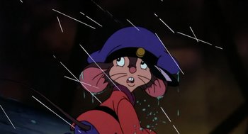Movie still from “An American Tail” (1986), directed by Don Bluth – A cartoon of a mouse wearing a purple hat; Close Up shot, Low angle
