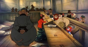 Movie still from “An American Tail” (1986), directed by Don Bluth – A group of people sitting at a long table; Wide shot, High angle