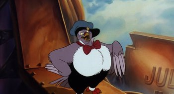 Movie still from “An American Tail” (1986), directed by Don Bluth – A cartoon of a bird wearing a hat and vest; Medium shot, Low angle