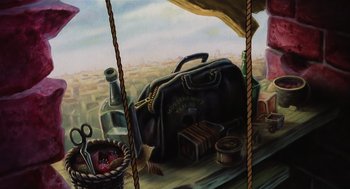 Movie still from “An American Tail” (1986), directed by Don Bluth – An oil painting of an open suitcase on a table; Wide shot, Low angle