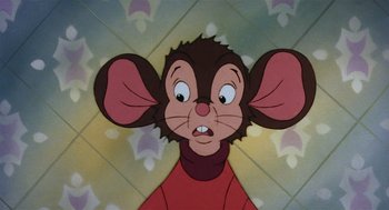 Movie still from “An American Tail” (1986), directed by Don Bluth – A cartoon of a mouse looking angry; Close Up shot, High angle