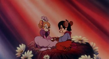 Movie still from “An American Tail” (1986), directed by Don Bluth – A couple of people sitting next to each other; Medium shot, High angle