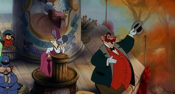 Movie still from “An American Tail” (1986), directed by Don Bluth – A couple of people that are standing up in a room; Medium shot, Low angle
