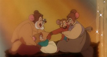 Movie still from “An American Tail” (1986), directed by Don Bluth – A group of people that are sitting in a room; Medium shot, High angle