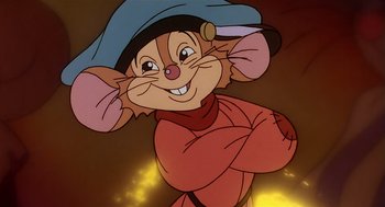 Movie still from “An American Tail” (1986), directed by Don Bluth – A cartoon of a mouse wearing a blue hat; Close Up shot, High angle