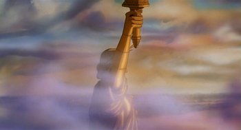 Movie still from “An American Tail” (1986), directed by Don Bluth – The statue of liberty is shown in the clouds; Wide shot, Low angle