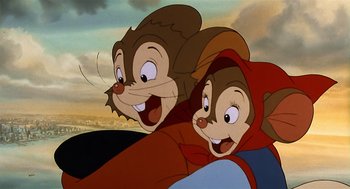 Movie still from “An American Tail” (1986), directed by Don Bluth – A couple of people that are sitting in a car together; Close Up shot, High angle