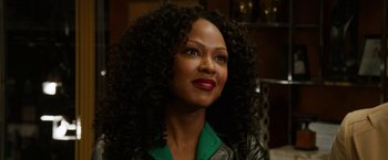 Movie still from “Anchorman 2: The Legend Continues” (2013), directed by Adam McKay – A person wearing a jacket; Close Up shot, Over the shoulder angle