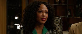 Movie still from “Anchorman 2: The Legend Continues” (2013), directed by Adam McKay – A person with long hair; Close Up shot, Over the shoulder angle