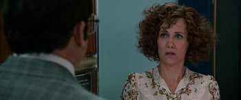 Movie still from “Anchorman 2: The Legend Continues” (2013), directed by Adam McKay – A man and a woman are looking at each other; Close Up shot, Over the shoulder angle