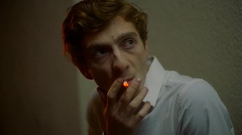 Movie still from “And Then We Danced” (2019), directed by Levan Akin – A man with a lit cigarette in his mouth; Close Up shot, Low angle