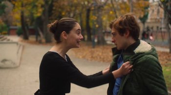 Movie still from “And Then We Danced” (2019), directed by Levan Akin – A young man and a young woman standing next to each other on a sidewalk; Medium shot, Over the shoulder angle