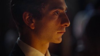 Movie still from “And Then We Danced” (2019), directed by Levan Akin – A young man's face in the dark; Close Up shot, Low angle