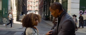 Movie still from “Annie” (2014), directed by Will Gluck – A man and a little girl on the sidewalk; Close Up shot, Over the shoulder angle